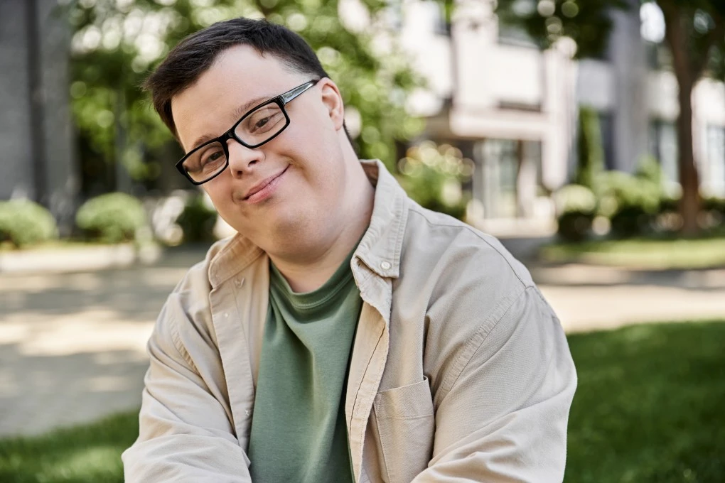 A disabled man smiling