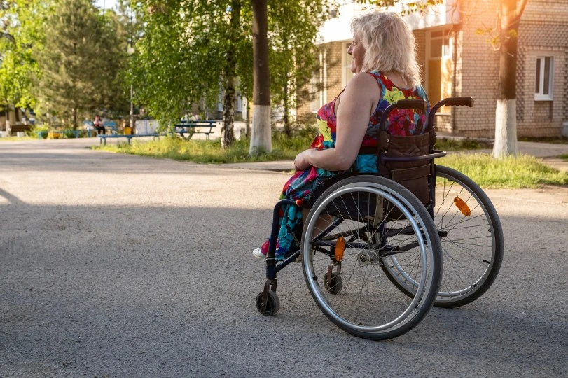 A disabled woman in her wheelchair